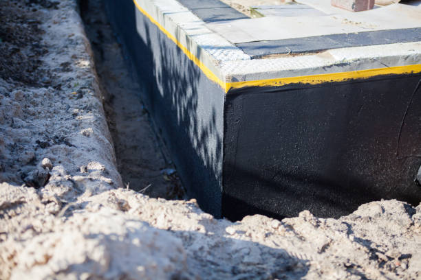 Professional Interior Drainage System technician working in Monticello, IL